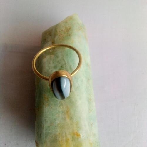 17916396925786209460494465287317 Ring made by bronze material and stone black onex